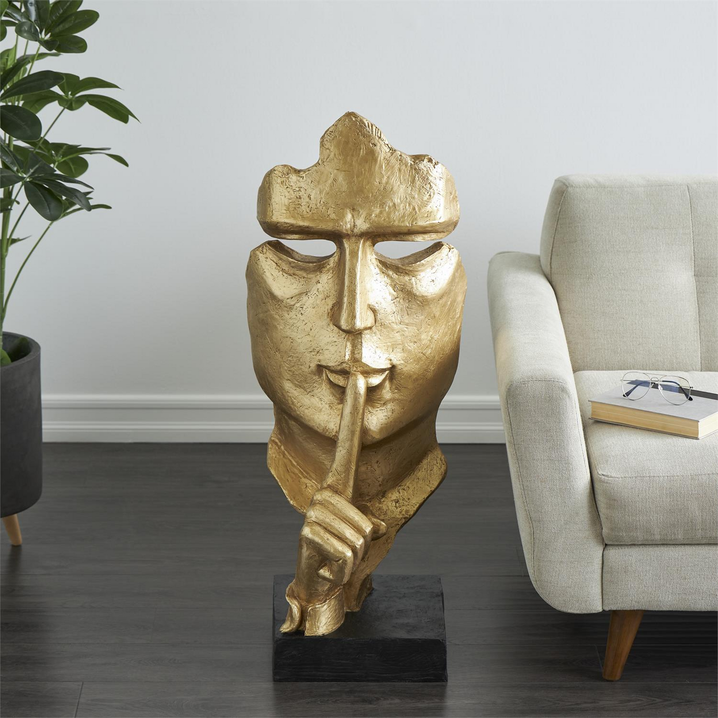Striking Gold Polystone Abstract Face Sculpture with Quiet Gesture, Large Cutout on Black Base, 14” W x 15" D x 40" H